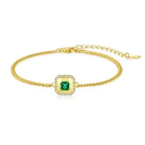 gold bracelet with green square gemstone