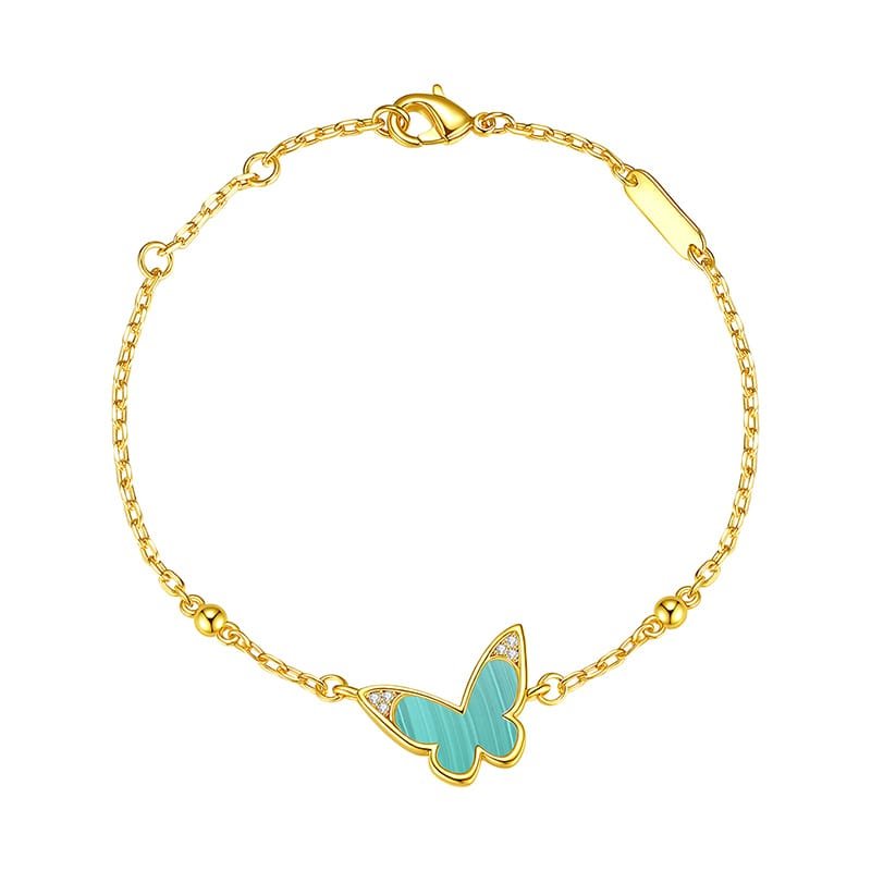 gold butterfly bracelet with turquoise stone
