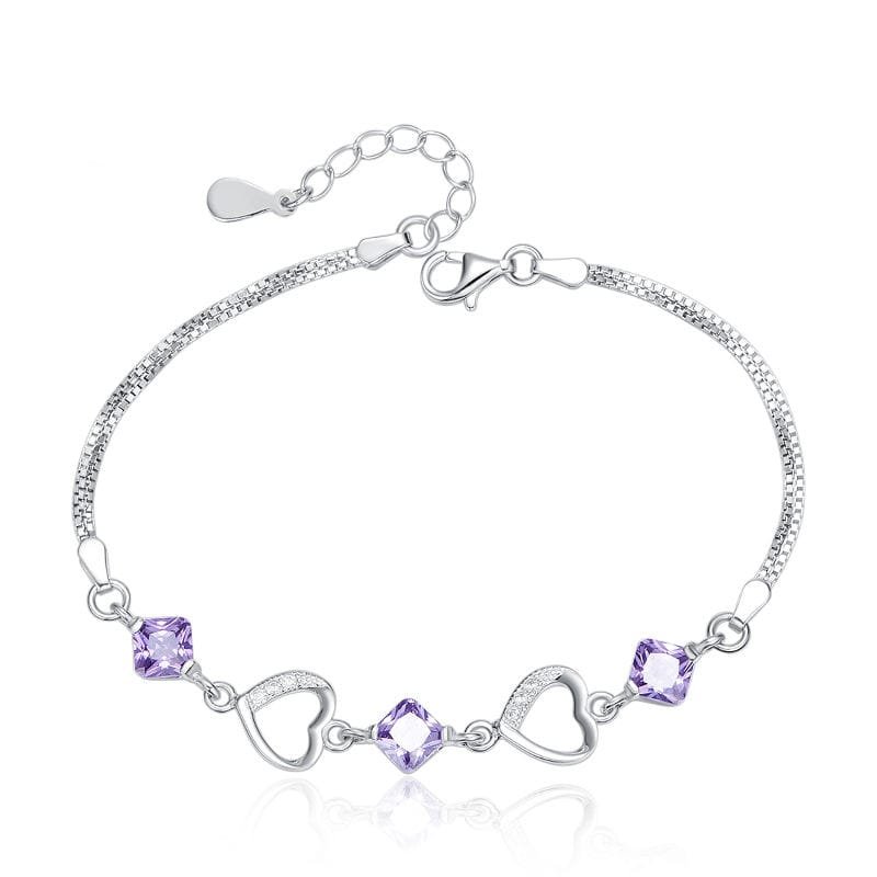 silver bracelet with purple gemstones